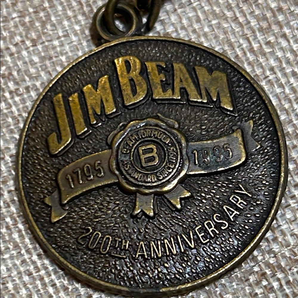 Vintage 1995 200th anniversary Jim Beam Brass Keychain.